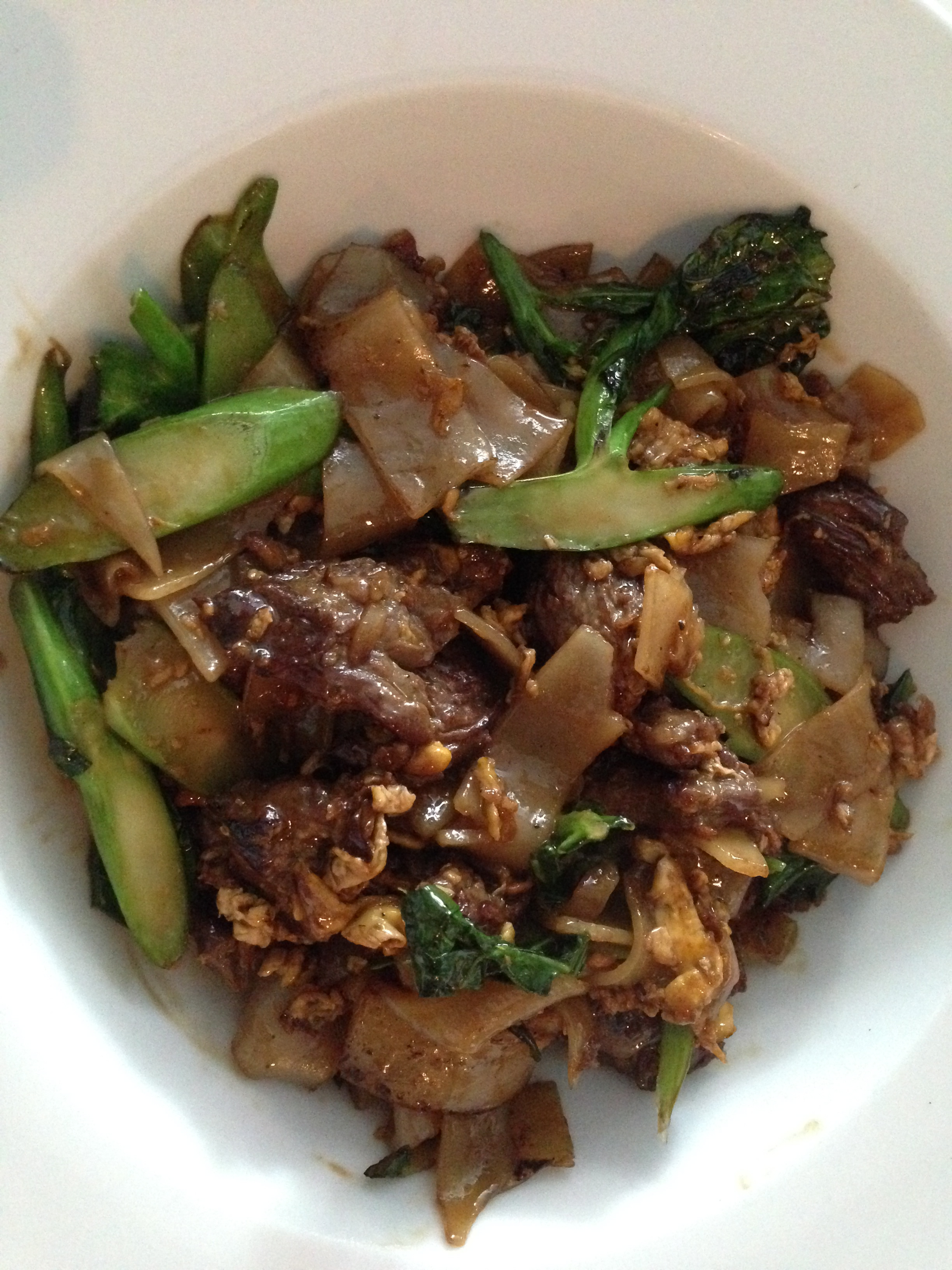 Pad See Ye with Beef.  (Rice noodles, Chinese Broccoli, Eggs, and chunks of steak) 